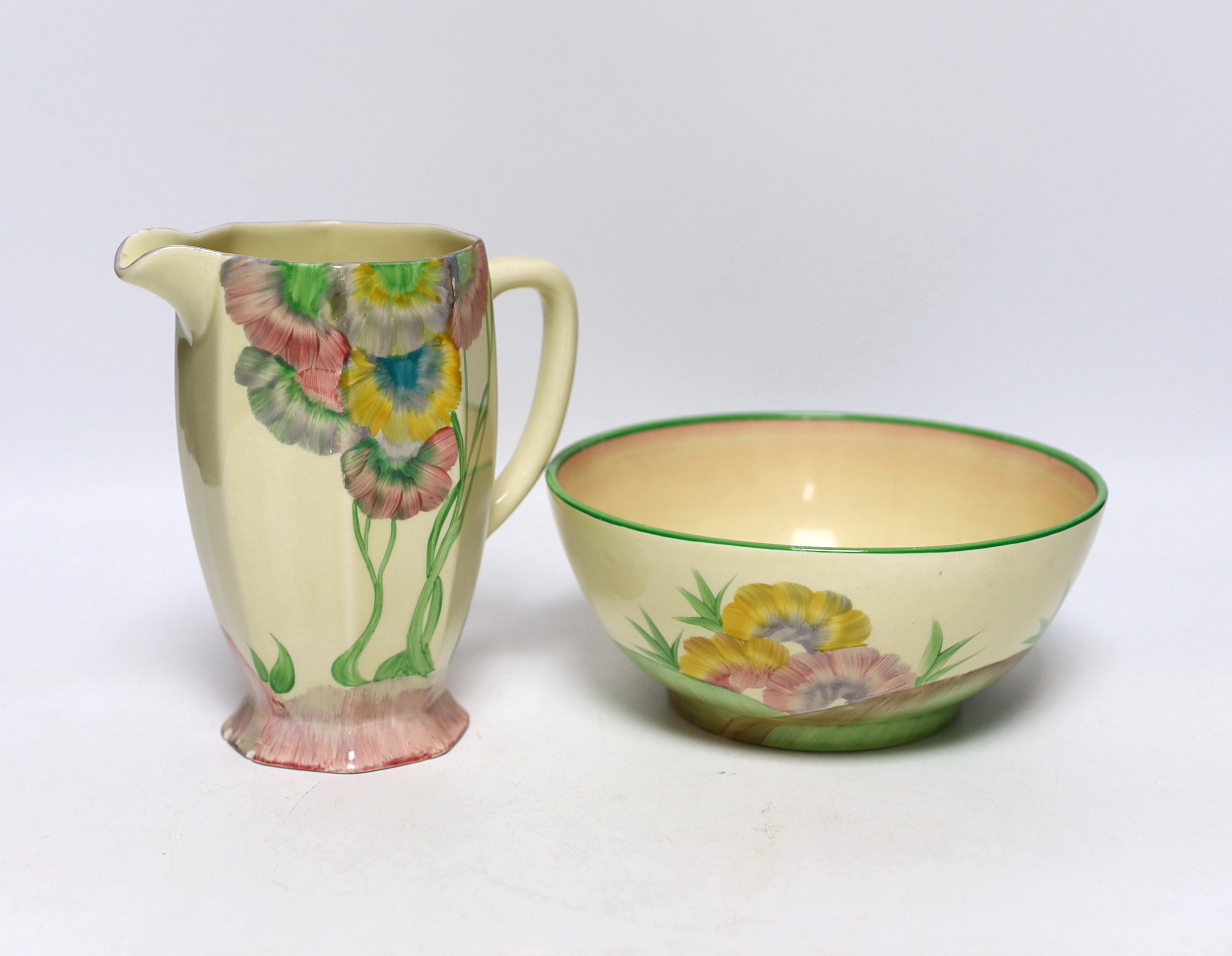 A Clarice Cliff Pink Pearls pattern jug and a related Wilkinson’s Honeyglaze bowl, Aurea pattern, 17cm